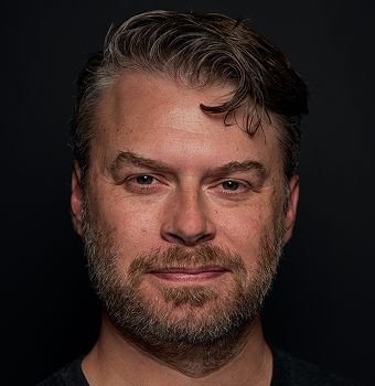 Headshot of Evan Phoenix